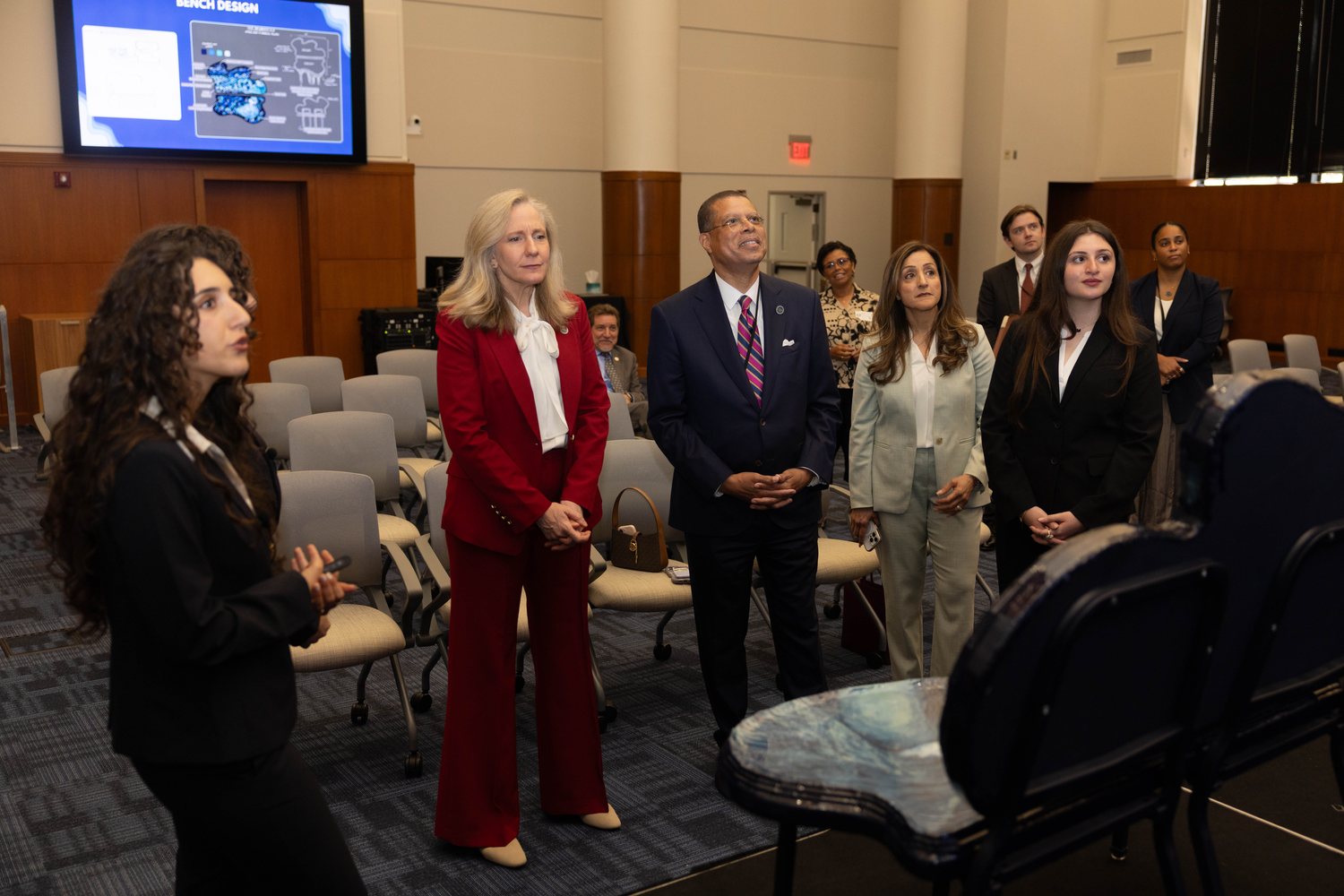 Orblynx students meeting county and state officials at a reception
